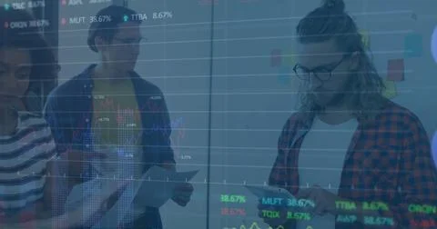 Image of stock market data processing and diverse colleagues with documents.. Stock Photos