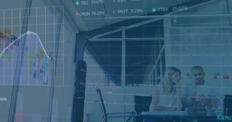 Image of stock market data processing over diverse male and female colleagu.. Stockfoto's