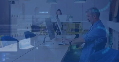 Image of stock market data processing against caucasian man using computer .. Stockfoto's