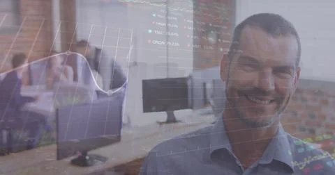 Image of stock market data processing over caucasian man smiling at office Stock Photos