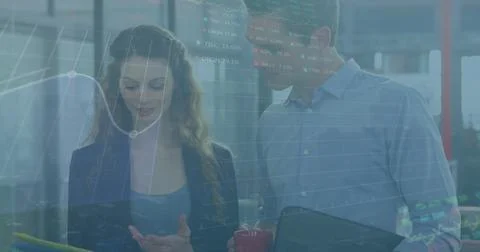 Image of stock market data processing against diverse colleagues discussing over Stockfoto's