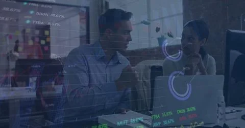 Image of stock market data processing against diverse man and woman discussing Stock Photos