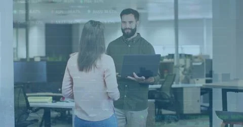 Image of stock market data processing over happy diverse man and woman Stock Photos