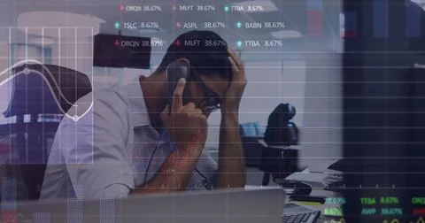 Image of stock market data processing over stressed biracial man talking on Stock Photos