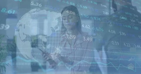 Image of stock market data processing and globe over diverse man and woman Foto stock