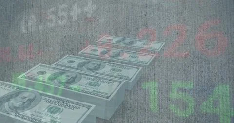 Image of stock market data processing over stack of dollar bills against grey Foto stock