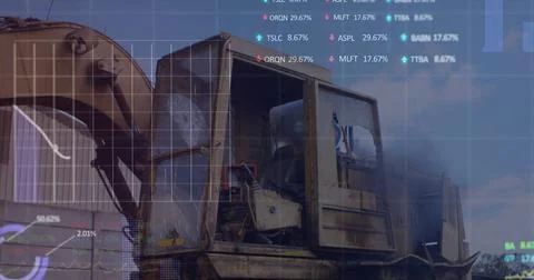 Image of stock market data processing over hydraulic vehicle operating at Foto stock