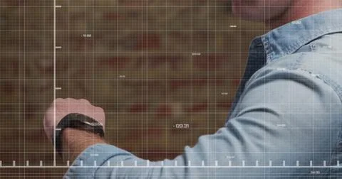 Image of stock market data processing over mid section of caucasian man usi.. Stock Photos