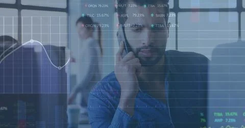Image of stock market data processing against biracial man talking on smart.. Stock Photos
