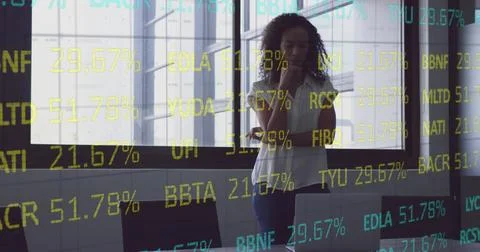 Image of stock market data processing over thoughtful african american woman at Stock Photos
