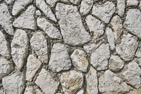 Image of stone rock texture wall. background closeup Stock Photos