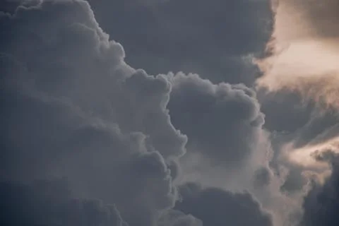Image of storm clouds during sunset in rural india Stock Photos