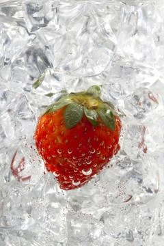 Image of strawberry on ice cubes Stock Photos