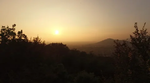 Image of the sunset through the trees Stock Footage 68732495