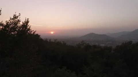 Image of the sunset through the trees Stock Footage 68767016