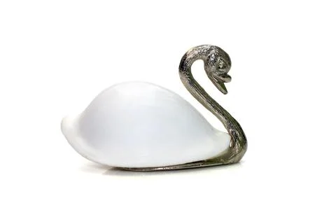 Image of swan sculpture with white shells(Ovula ovum) as part of its body. is Stock Photos