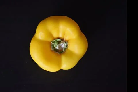 Image of sweet yellow paprika pepper isolated on black Stock Photos