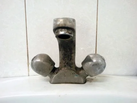 This is the image of a tap in the bathroom Stock Photos