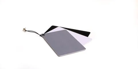 Image of test cards: gray, white, black for filming on a white background. Foto stock