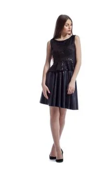 Image of thoughtful brunette posing in smart dress Stock Photos