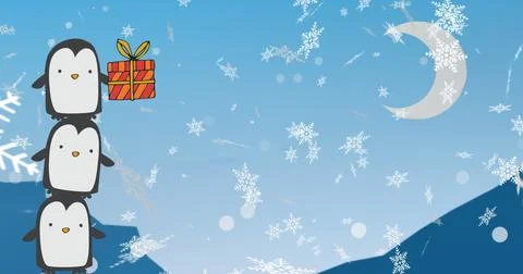 Image of tower of three penguins holding christmas gift over snowflakes and Ilustração Stock