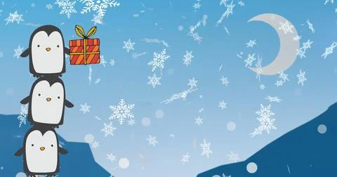 Image of tower of three penguins holding christmas gift over snowflakes and Ilustração Stock