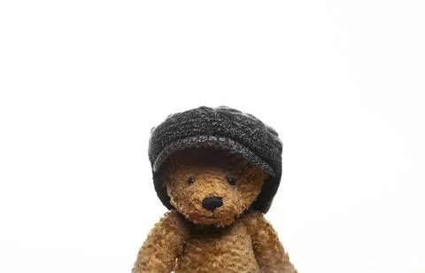 Image of toy bear cap white background Stock Photos