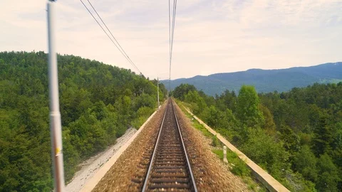 Image of a train moving over rail tracks during the day, Croatia. Stock Footage 114696523