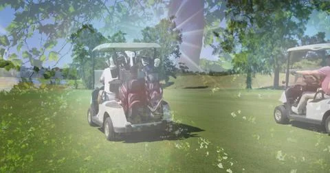 Image of trees over golf carts on golf course Fotos Stock