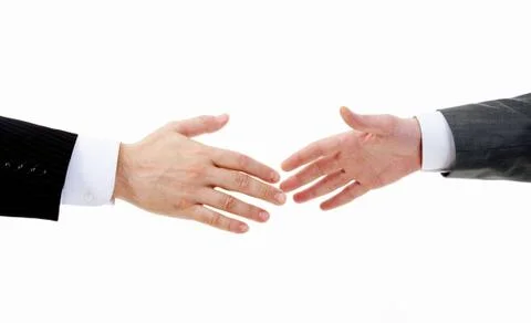 Image of two arms in isolation before business handshake Stock Photos