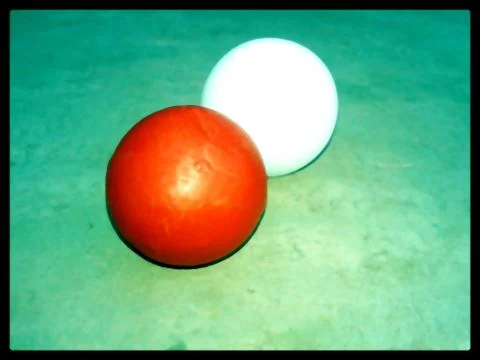 This is the image of two ball which in two colour whit and red Stock Photos