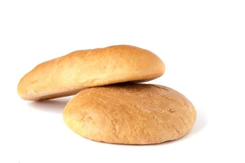 Image of two loaves of bread on a white background. Stock Photos