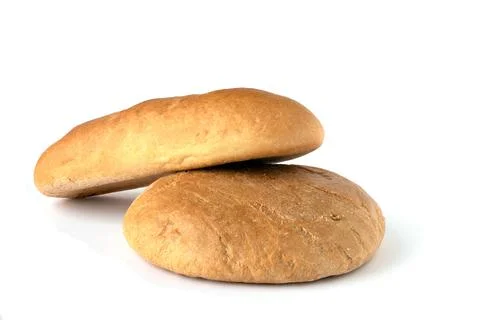 Image of two loaves of bread on a white background. Stock Photos
