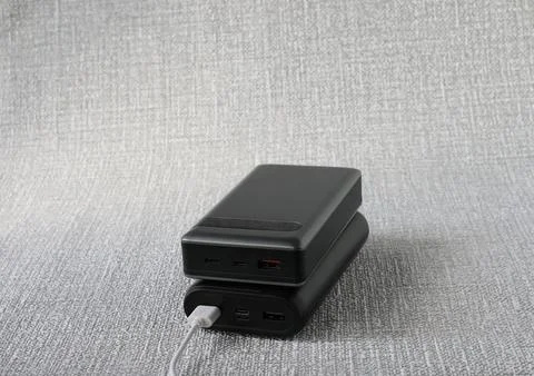 Image of two powerful mobile power banks . Stock Photos