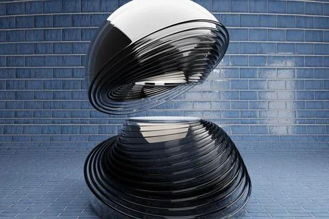 Image of two shiny black iron round objects with layers and a light center on th 库存插图