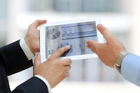 Image of two young businessmen using touchpad Stock Photos