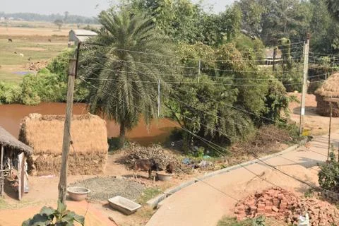 Image of a typical cemented road inside a village in West bengal Stock Photos
