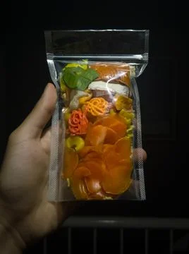 An image of uncooked Sundanese crackers called "Seblak" Stock Photos