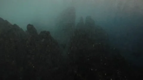 Image of underwater spiers with waves creating the foam Stock Footage 232367180