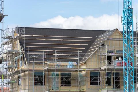 Image of Unfinished roof timber frames being built for modern scandinavian Stock Photos