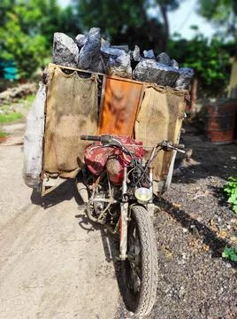 Image of a unique bicycle designed for transporting coal. Stock Photos