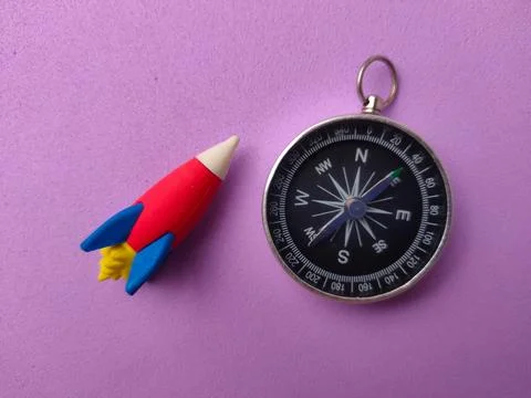 This image uses symbolic objects to represent the intersection of navigatio.. Stock Photos