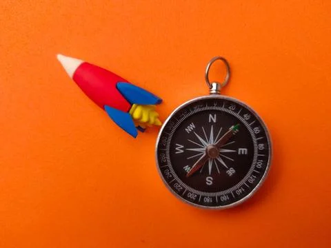 This image uses symbolic objects to represent the intersection of navigatio.. Stock Photos