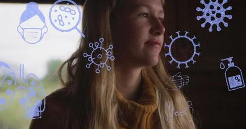 Image of virus, mask, sanitizers vector icons moving over caucasian woman Stock Photos