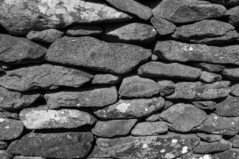 An image of a wall made up of large rocks ideal for background or textures, i Stock Photos
