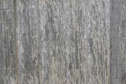 The image is of a wall with a rough, textured surface Stock Photos