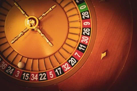 The image of a warm-colored roulette wheel Stock Photos