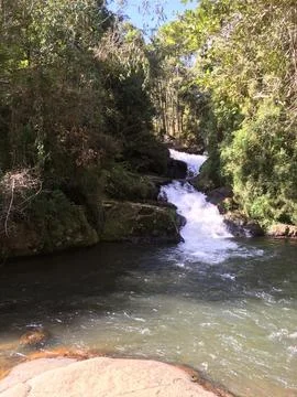 Image of waterfall in the middle of the forest Stock Photos