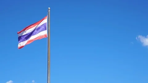 Image of waving Thai flag on blue sky Stock Footage 71750653