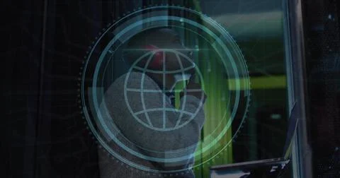 Image of web globe icon over african american male engineer using laptop at.. Stock Photos